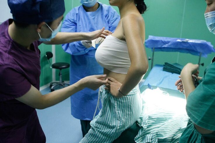 breast exam after breast augmentation surgery